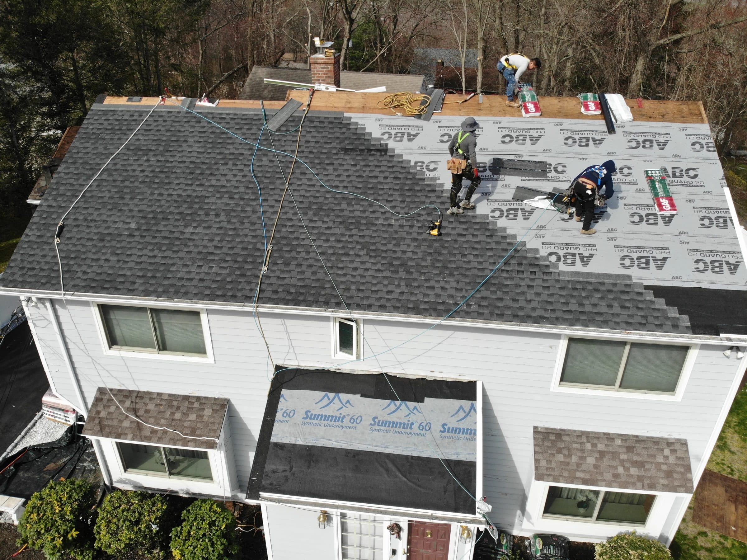 Our crew installing a new shingle roof, seen from above